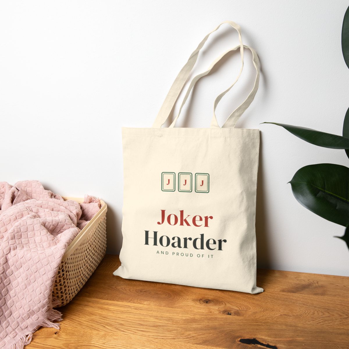 Joker Hoarder mahjong canvas tote bag on a table