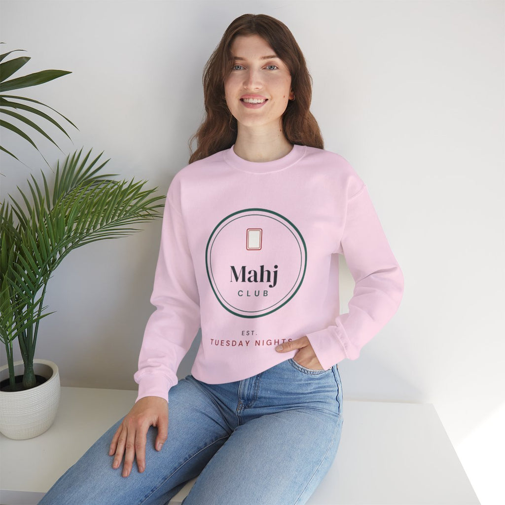 Mahj Club, Est. Tuesday Nights mahjong sweatshirt worn at home, shown in Light Pink