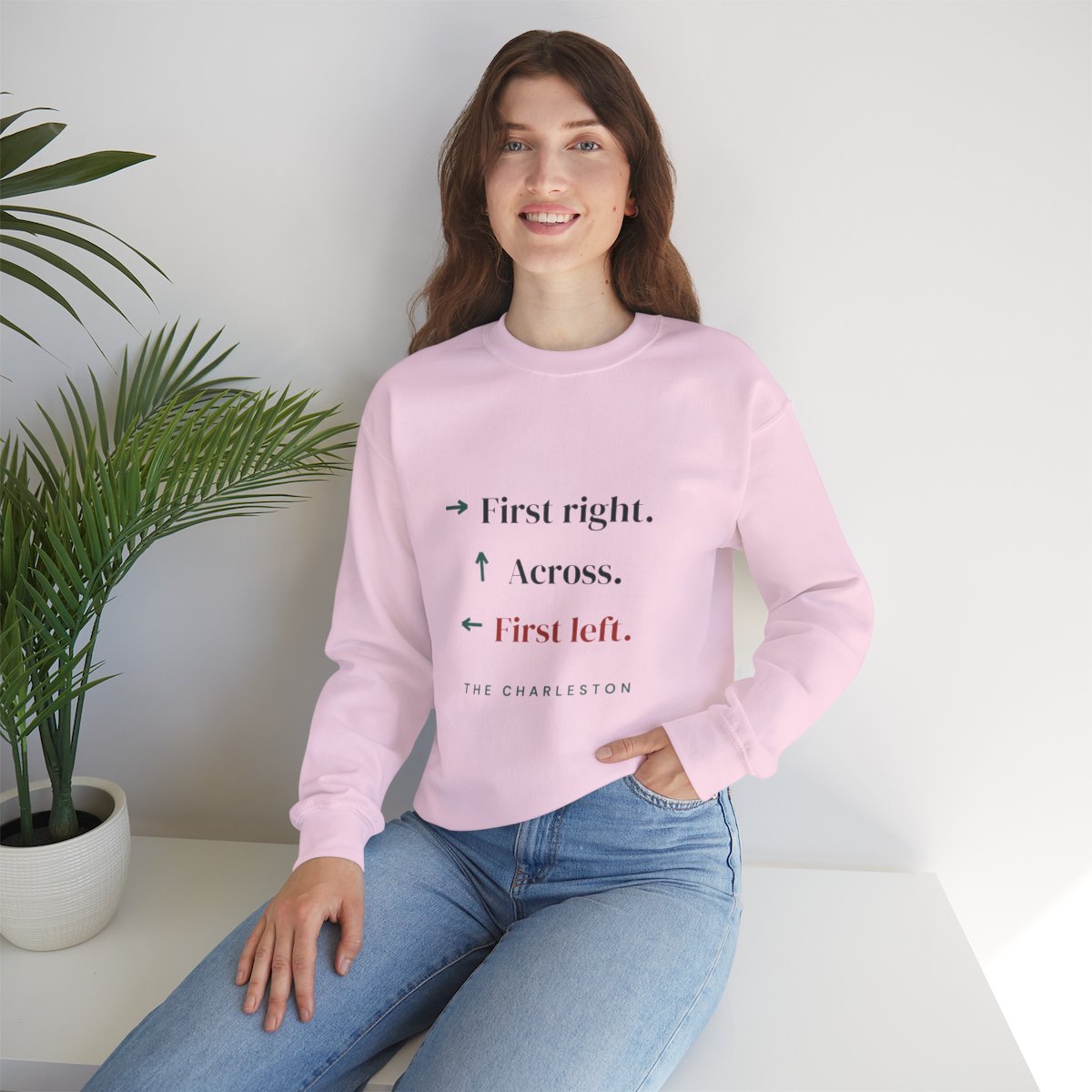 The Charleston mahjong sweatshirt worn at home, shown in Light Pink